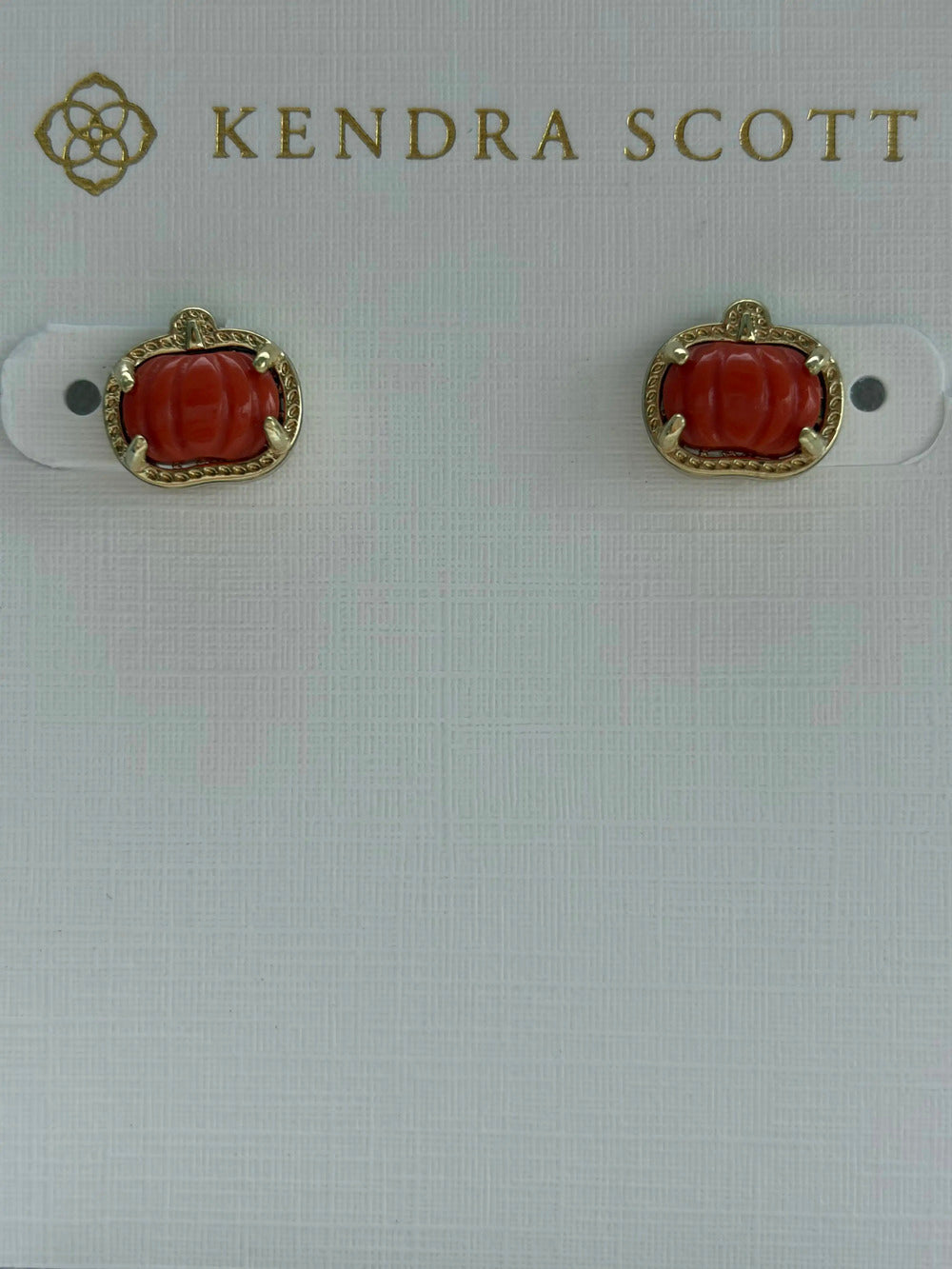 Kendra Scott's red pumpkin earrings